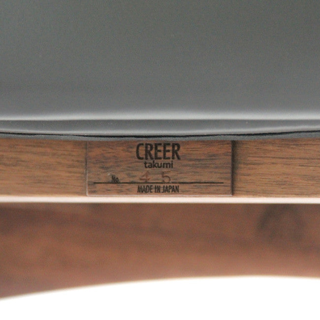 Chaise haute rembourrée en bois massif