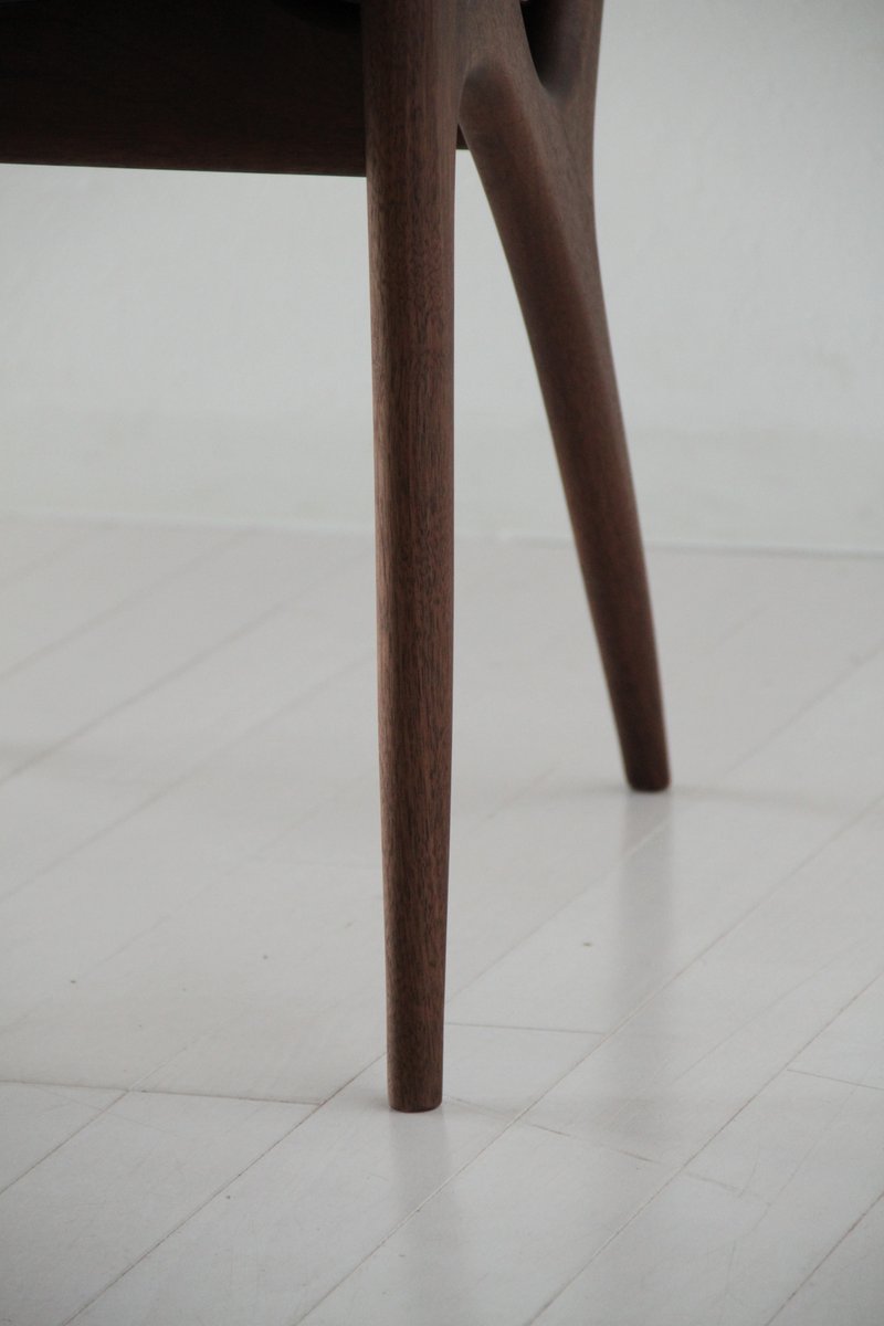 Chaise rembourrée en bois massif