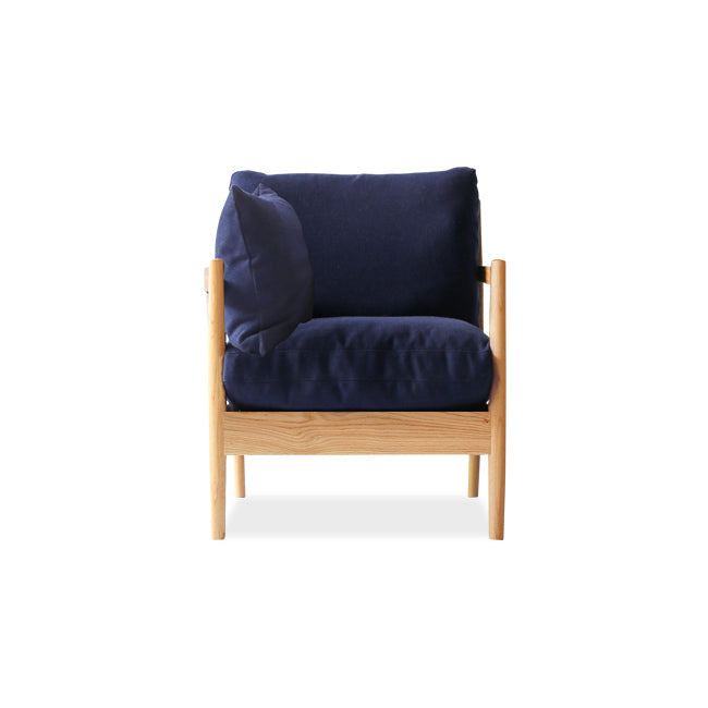 Fauteuil rembourré en bois massif