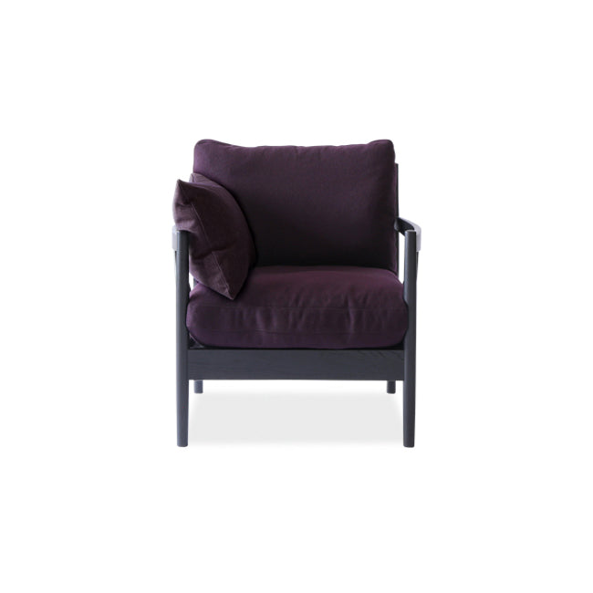 Fauteuil rembourré en bois massif