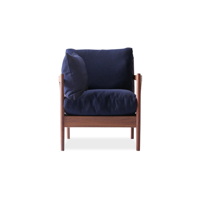 Fauteuil rembourré en bois massif